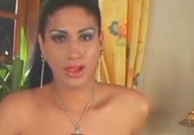 shemale in fishnets in a solo performance