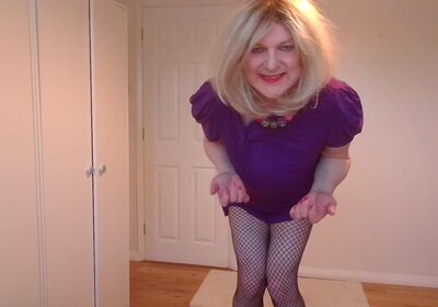 Purple minidress, no bra and fishnets